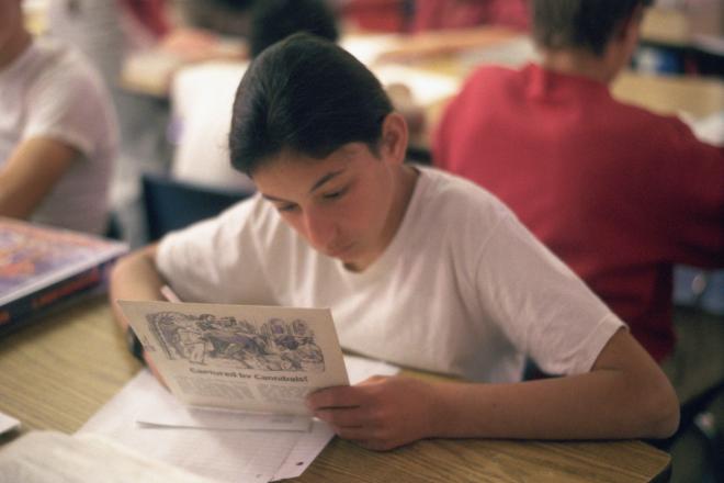 Castile Canyon Scientology School, student reading in class room