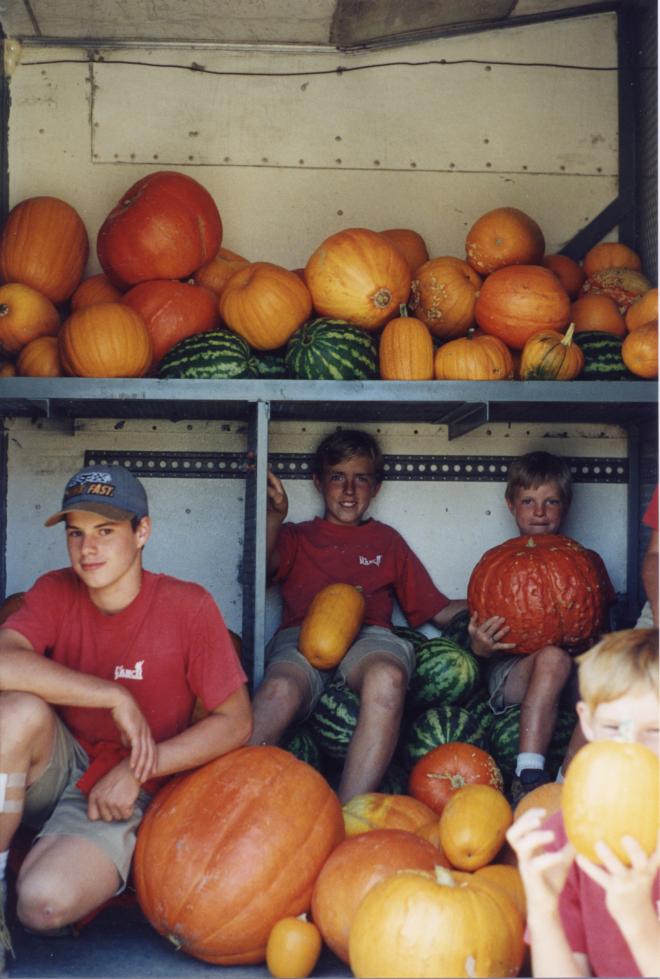 Castile Canyon Scientology School, three boys showing their pumpkin harvest